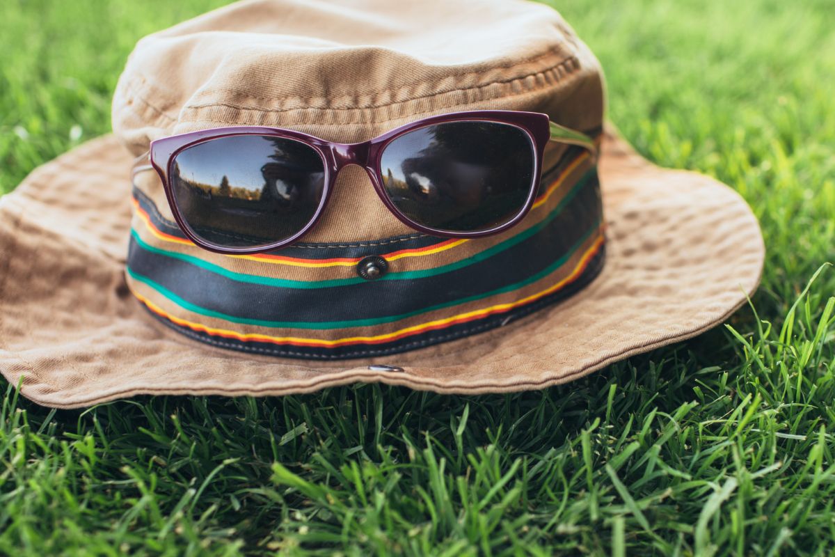 wear a hat and sunglasses when camping in the sun and heat